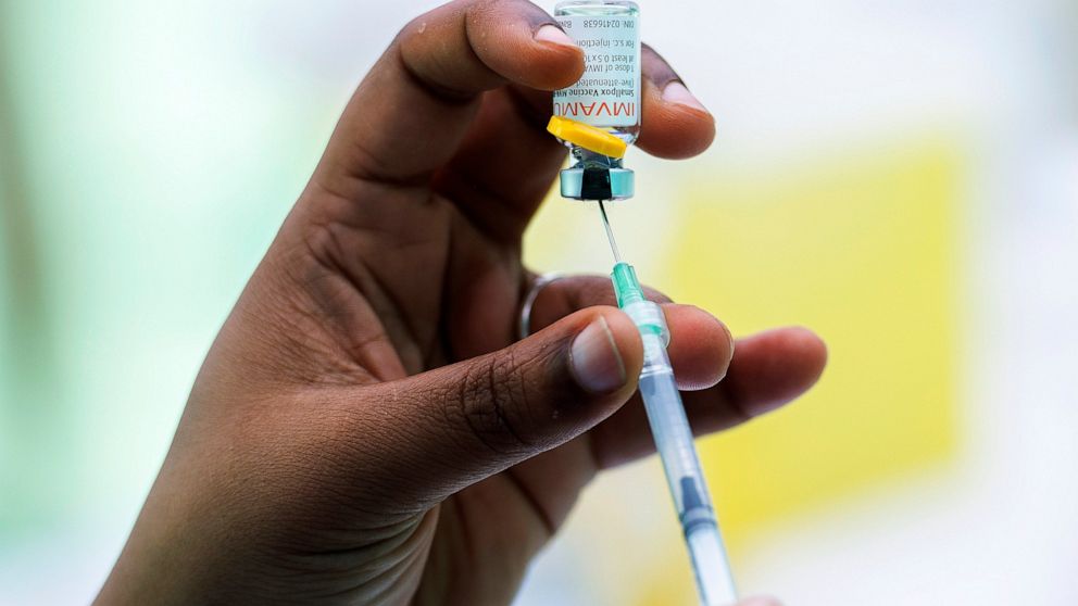 FILE - A health care worker prepares a monkeypox vaccine in Montreal, Saturday, July 23, 2022. Nearly 800,000 doses of the monkeypox vaccine will soon be available for U.S. distribution, U.S. health regulators said Wednesday, July 27, 2022. (Graham H