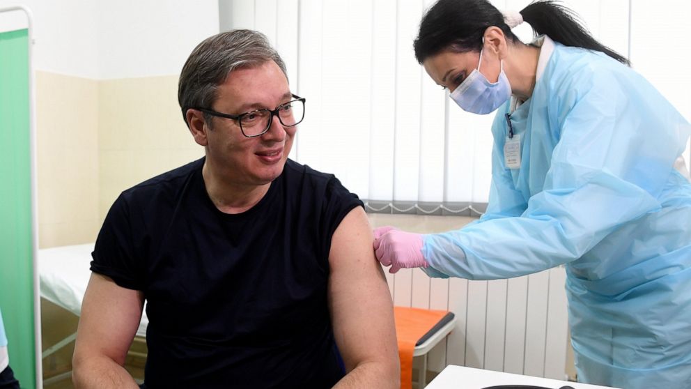 In this photo provided by the Serbian Presidential Press Service, Serbian President Aleksandar Vucic receives a dose of the Chinese Sinopharm vaccine in the village of Rudna Glava, Serbia, Tuesday, April 6, 2021. Vucic finally rolled up his sleeve fo