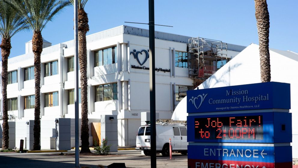 A message is displayed on a sign at the entrance to Mission Community Hospital in the Panorama City section of Los Angeles on Tuesday, Sept. 20, 2022. Authorities are searching for a man suspected of stabbing an employee at the hospital, prompting a 