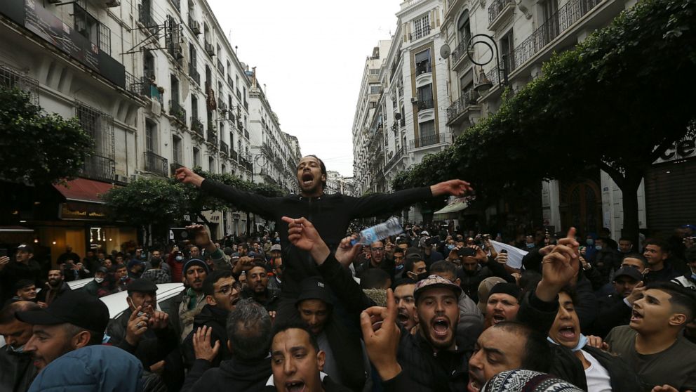 Algerians demonstrate in Algiers to mark the second anniversary of the Hirak movement, Monday Feb. 22, 2021. February 22 marks the second anniversary of Hirak, the popular movement that led to the fall of Algerian President Abdelaziz Bouteflika. (AP 