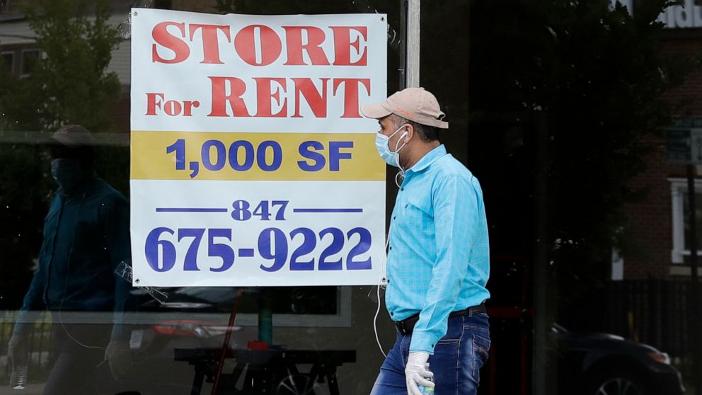FILE - A Store For Rent sign is displayed at a retail property in Chicago, on June 20, 2020. As much as 20% of a federal pandemic relief program intended to help small businesses weather the COVID-19 outbreak is believed to have gone to fraudsters, w