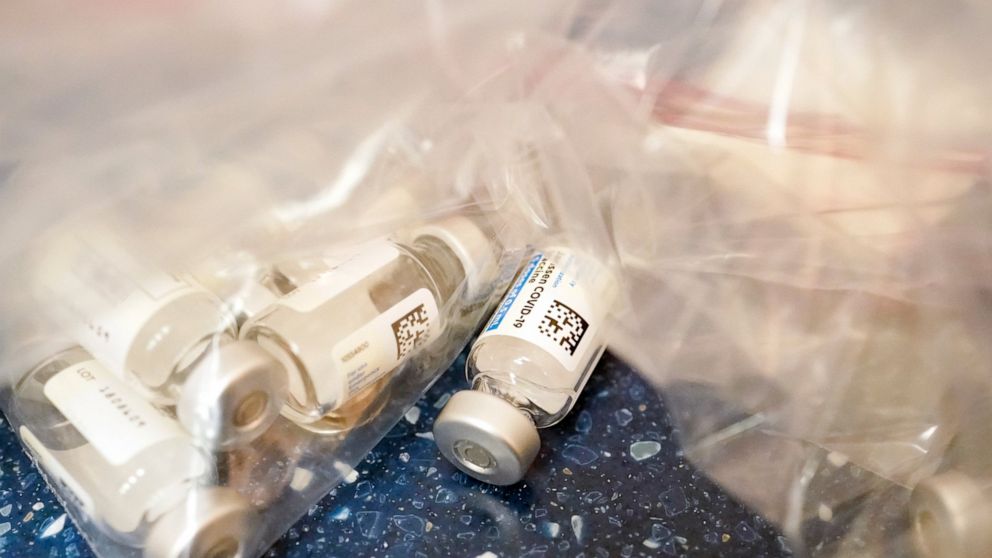 FILE - This Wednesday, March 31, 2021 file photo shows empty vials of Johnson & Johnson's one-dose COVID-19 vaccine at a mobile vaccination site in Uniondale, N.Y. On Thursday, Oct. 21, 2021, advisers to the Centers for Disease Control and Prevention