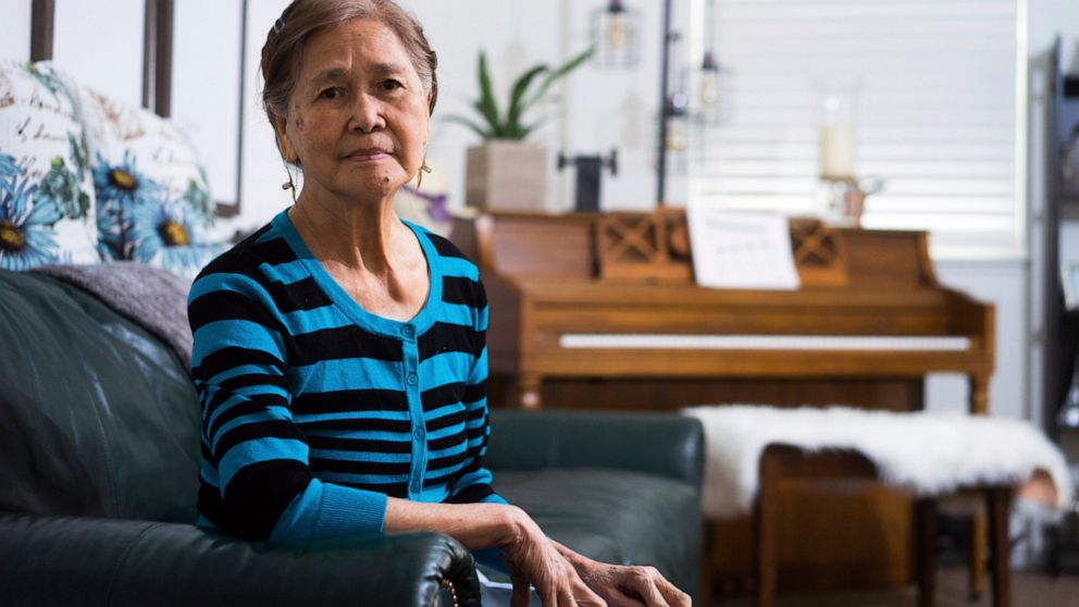 In this Friday, March 1, 2019 photo, Normita Lim poses for a photograph at her home in Concord, Calif. Lim did not receive back pay from her former employer, Publico, who paid her $2 an hour. Residential senior care homes are treating workers as inde