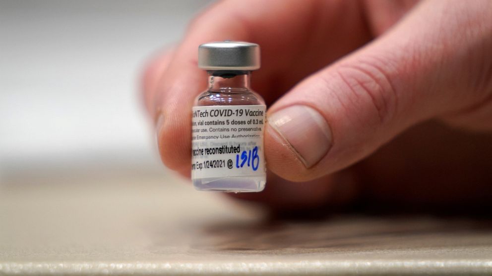 FILE - In this Jan. 24, 2021, file photo, a vial of the Pfizer vaccine for COVID-19 is shown at a one-day vaccination clinic set up in an Amazon.com facility in Seattle and operated by Virginia Mason Franciscan Health. Pfizer’s vaccine is authorized 