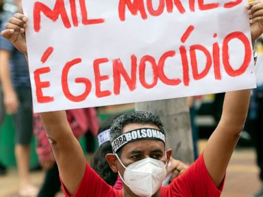 As Brazil tops 500,000 deaths, protests against president