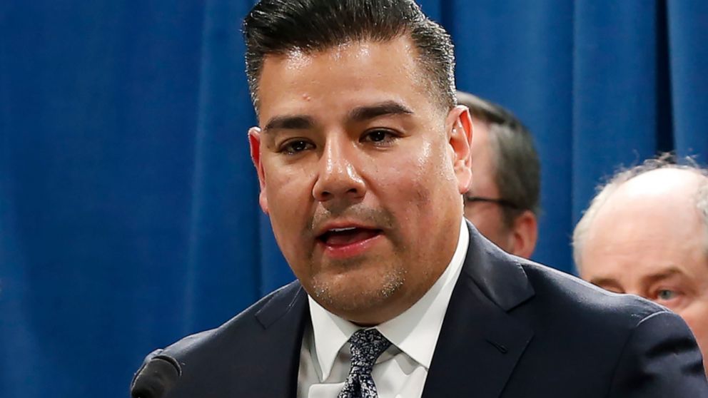 FILE — In this Tuesday, Feb. 18, 2020 file photo is California Insurance Commissioner Ricardo Lara at a state Capitol news conference in Sacramento, Calif. On Monday, April 13, 2020, Lara ordered some companies to refund insurance premiums for March 