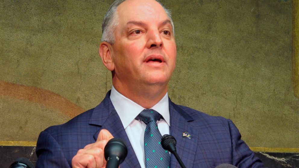 FILE - In this Thursday, Sept. 20, 2018 file photo, Gov. John Bel Edwards talks about an expected $300 million-plus surplus Louisiana will have from the last budget year in Baton Rouge, La. Nearly three decades ago, when Democratic Louisiana Gov. Joh