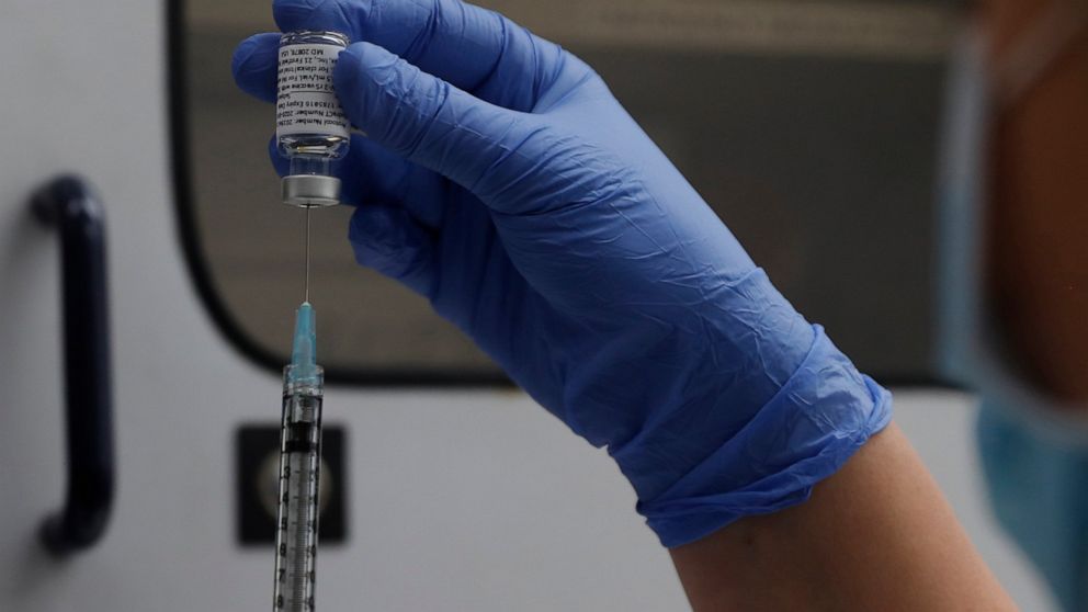 FILE - A vial of the Phase 3 Novavax coronavirus vaccine is seen ready for use in the trial at St. George's University hospital in London, Oct. 7, 2020. The Novavax COVID-19 vaccine that could soon win federal approval may offer a boost for the U.S. 