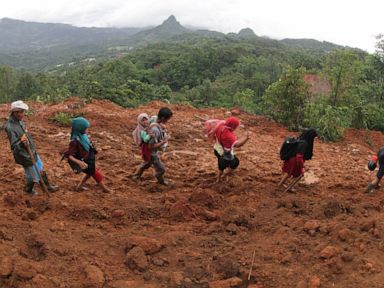 Mudslides, blackouts hamper search after Indonesia floods