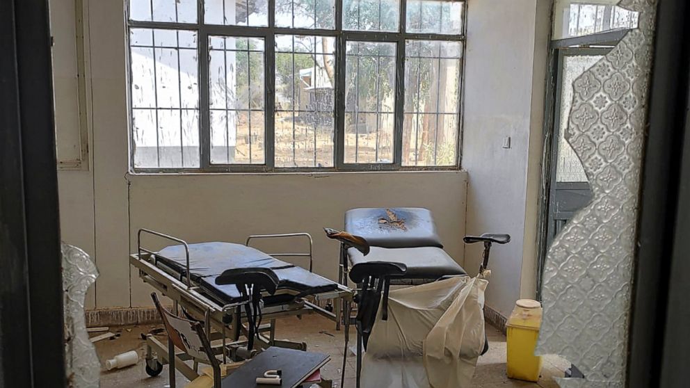 In this photo released by Medecins Sans Frontieres, a damaged operating theater is seen through broken glass at a hospital in Sheraro, in the Tigray region of northern Ethiopia, in this undated photo taken in 2021. Health facilities in Ethiopia's emb