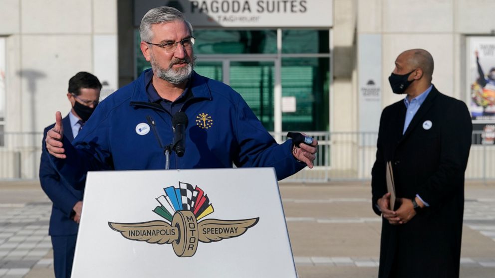 Indiana Gov. Eric Holcomb speaks after receiving his Johnson & Johnson COVID-19 vaccine during the state's first mass vaccination clinic at the Indianapolis Motor Speedway, Friday, March 5, 2021, in Indianapolis. The state health department said near