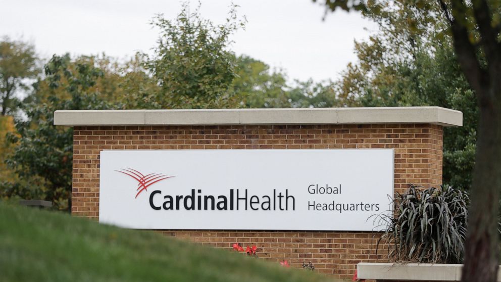 A sign is displayed at the Cardinal Health, Inc. corporate office Wednesday, Oct. 16, 2019, in Dublin, Ohio. Shares of big drug distributors soared Wednesday on word of a potential settlement ahead of the first federal trial over the opioid crisis. T