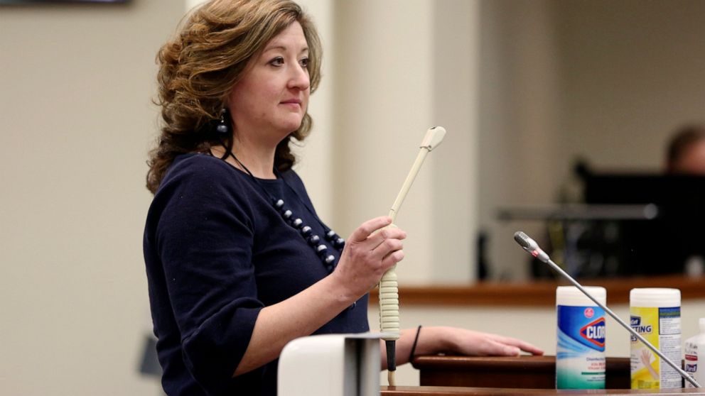 Melissa Anne "Mac" Cunningham-Sereque shows the wand used to do ultrasound on pregnant women during a South Carolina House subcommittee hearing on an abortion bill on Wednesday, Feb. 3, 2021, in Columbia, S.C. The bill would outlaw almost all abortio