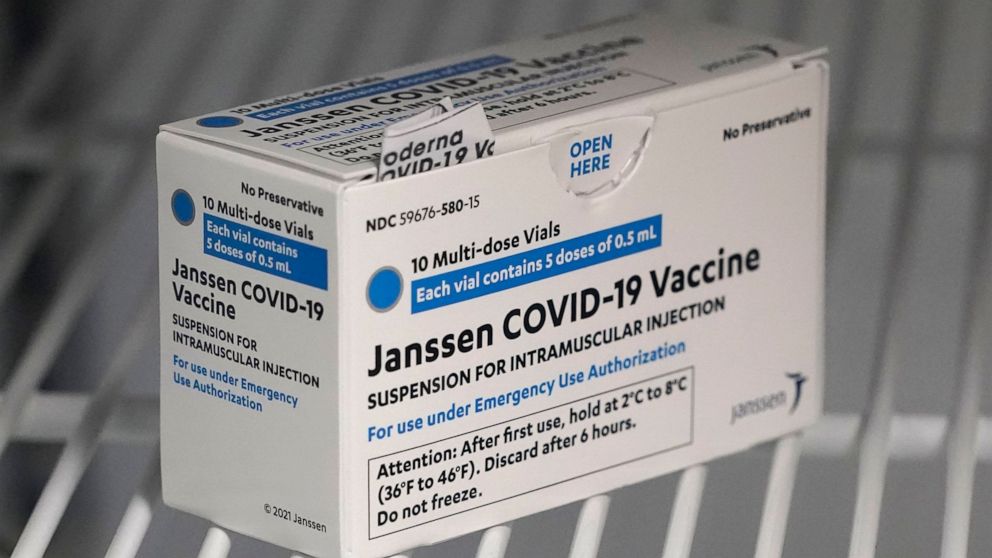 FILE - In this March 25, 2021 file photo, a box of the Johnson & Johnson COVID-19 vaccine is shown in a refrigerator at a clinic in Washington state. A batch of Johnson & Johnson’s COVID-19 vaccine failed quality standards and can’t be used, the drug