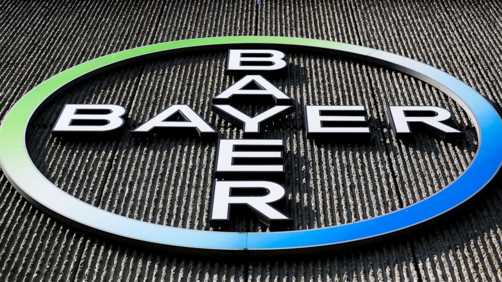 FILE - This Monday, May 23, 2016, file photo, shows the Bayer AG corporate logo displayed on a building of the German drug and chemicals company in Berlin. Three schoolteachers in Washington state who sued chemical company Monsanto over exposure to m