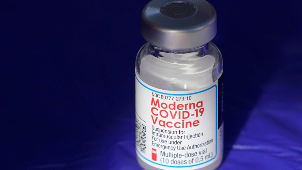 FILE - In this March 4, 2021 file photo, a vial of the Moderna COVID-19 vaccine rests on a table at a drive-up mass vaccination site in Puyallup, Wash., south of Seattle. Moderna’s COVID-19 vaccine brought in nearly $7 billion in the final quarter of