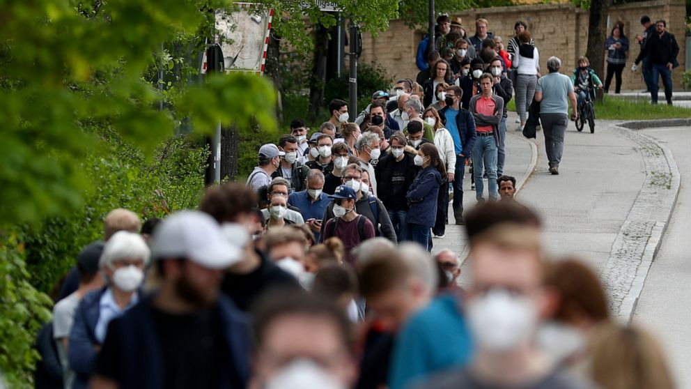 The Latest: 4 million cases in Germany since pandemic began