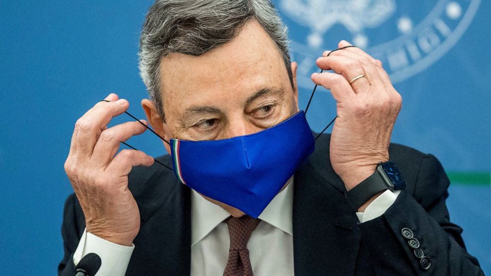 Italian Premier Mario Draghi attends a press conference at Chigi Palace government office in Rome, Thursday, July 22, 2021. With COVID-19 cases rising again, Italy will start requiring people to have a so-called “green pass” to access venues like gym