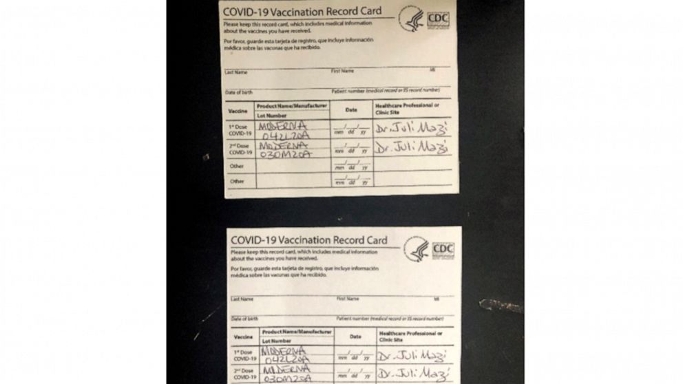 This undated image provided by the United States District Court for the Northern District of California shows two fake CDC COVID-19 Vaccination Record Cards that are part of a criminal complaint. With more than 600 colleges and universities now requi