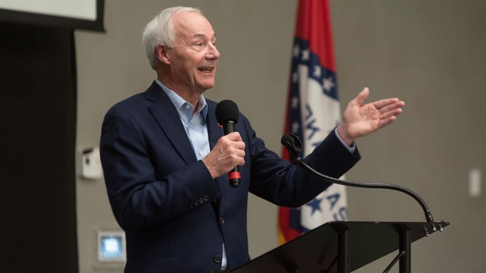 FILE - In this July 15, 2021 file photo, Arkansas Gov. Asa Hutchinson speaks during a town hall meeting in Texarkana, Ark. Public health researchers on Tuesday, July 20, 2021, called the rapid rise in coronavirus cases and hospitalizations in Arkansa