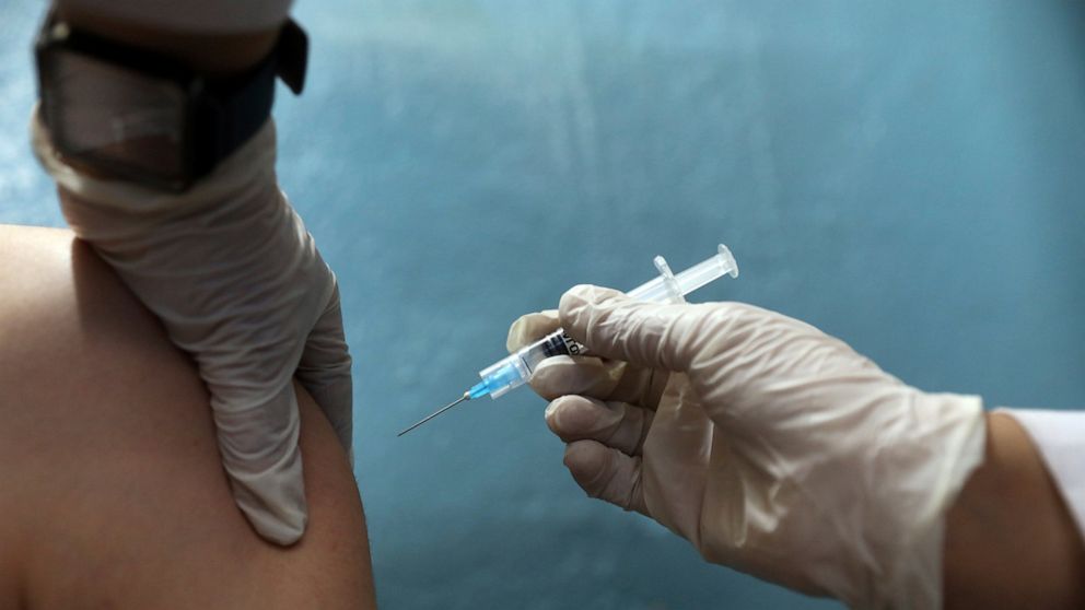 The Latest: Moscow orders mandatory vaccine jabs for many