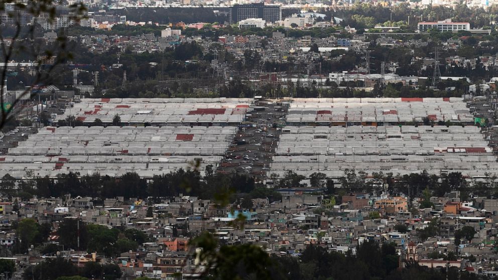 The Central de Abasto market, Mexico City's main food distribution center is seen amid the new coronavirus pandemic, Wednesday, June 3, 2020. The wholesale market installed its own testing center and triage area, and instituted contact tracing long b