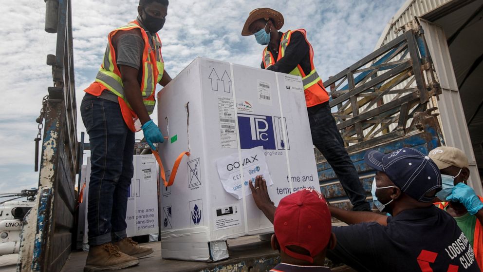 Boxes of AstraZeneca COVID-19 vaccine manufactured by the Serum Institute of India and provided through the global COVAX initiative arrive at the airport in Mogadishu, Somalia Monday, March 15, 2021. The first shipment of 300,000 doses of the AstraZe