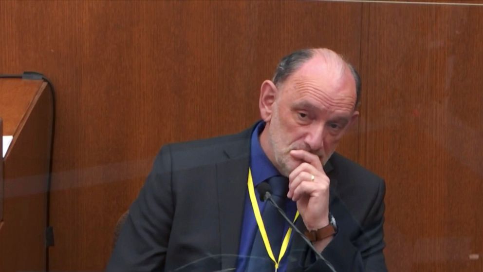In this image from video, Dr. David Fowler, a retired forensic pathologist and former chief medical examiner for the state of Maryland is questioned by prosecutor Jerry Blackwell, as Hennepin County Judge Peter Cahill presides, Wednesday, April 14, 2