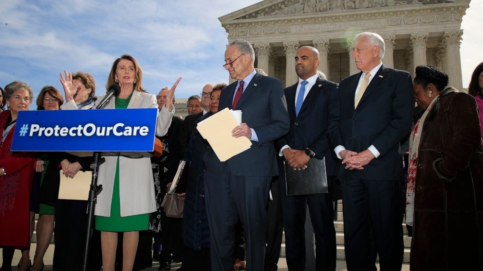 House Speaker Nancy Pelosi of California with Senate Minority Leader Chuck Schumer of New York Rep. Colin Allred D-Texas House Majority Leader Steny Hoyer of Maryland Rep. Sheila Jackson Lee D-Texas and other Democrat leaders speaks outside the U