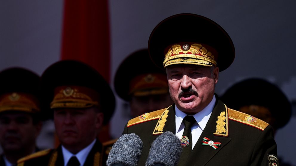 Belarusian President Alexander Lukashenko gives a speech during a military parade that marked the 75th anniversary of the allied victory over Nazi Germany, in Minsk, Belarus, Saturday, May 9, 2020. (Sergei Gapon/Pool via AP)