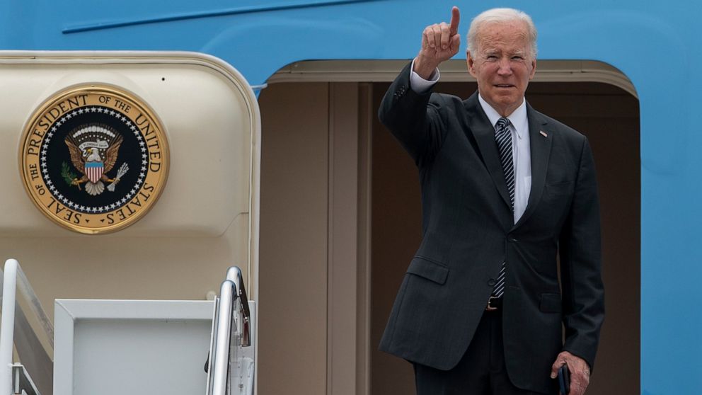 President Joe Biden gestures as he boards Air Force One Monday, Sept. 12, 2022, at Andrews Air Force Base, Md. (AP Photo/Gemunu Amarasinghe)