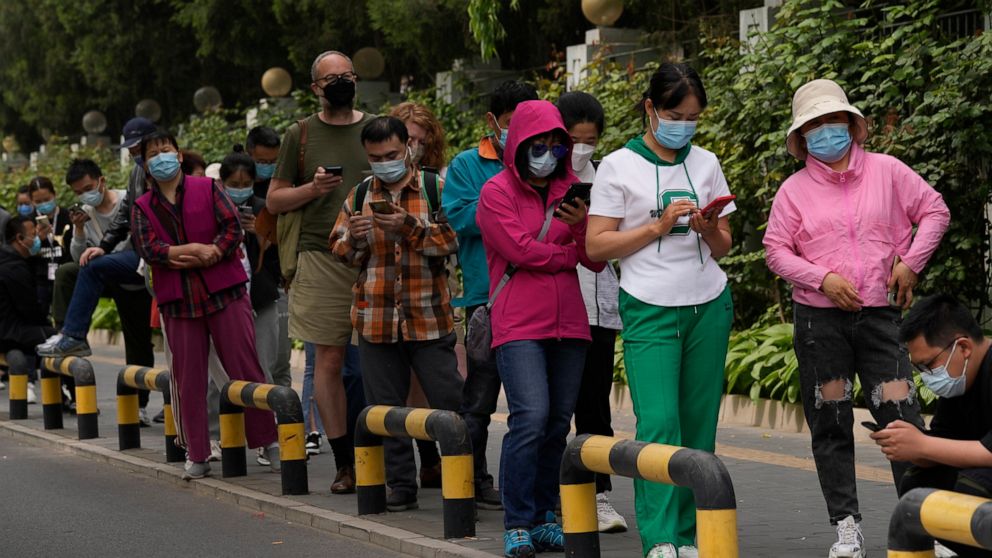 Beijing districts placed under lockdown as cases mount