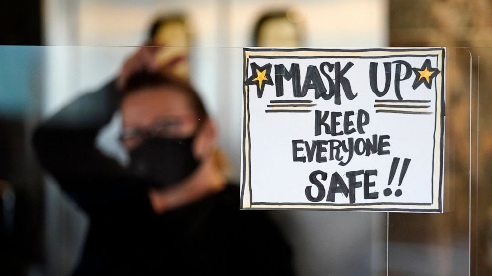 Keep the mask A vaccine won't end the US crisis right