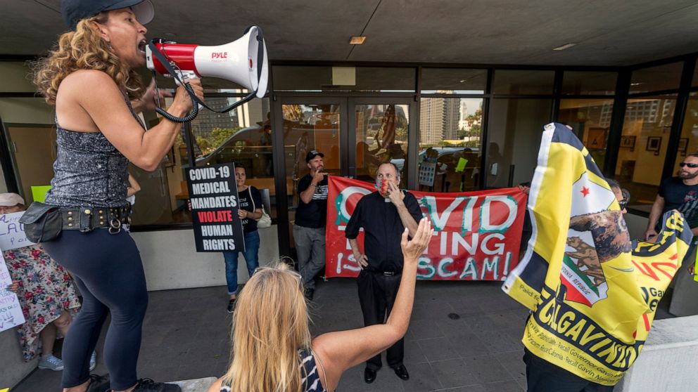 Anti-vaccine mandate protesters and supporters of the California recall election rally outside the front doors of the Los Angeles Unified School District, LAUSD headquarters in Los Angeles Thursday Sept. 9, 2021. The Los Angeles board of education vo