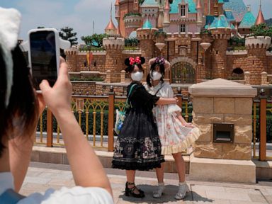 Hong Kong Disney opens as COVID eases; Shanghai deaths rise