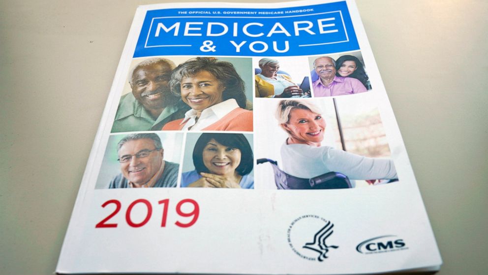 FILE - In this Nov. 8, 2018, file photo, the U.S. Medicare Handbook is photographed, in Washington. Medicare could save $1.57 for every dollar spent delivering free meals to frail seniors in the first week after they come home following a hospitaliza