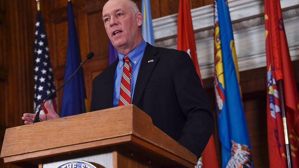 FILE - In this Jan. 5, 2021 file photo Montana Gov. Greg Gianforte speaks to members of the press in the Governor's Reception Room of the Montana State Capitol in Helena, Mont. Montana House lawmakers voted Monday, Jan. 25, 2021, to advance four bill