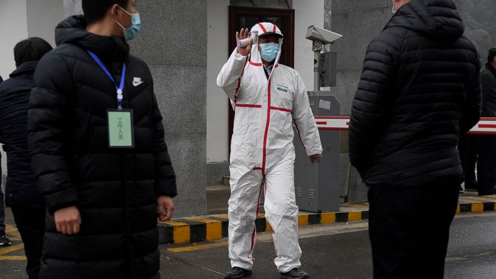 WHO team in Wuhan visits provincial disease control center - ABC News