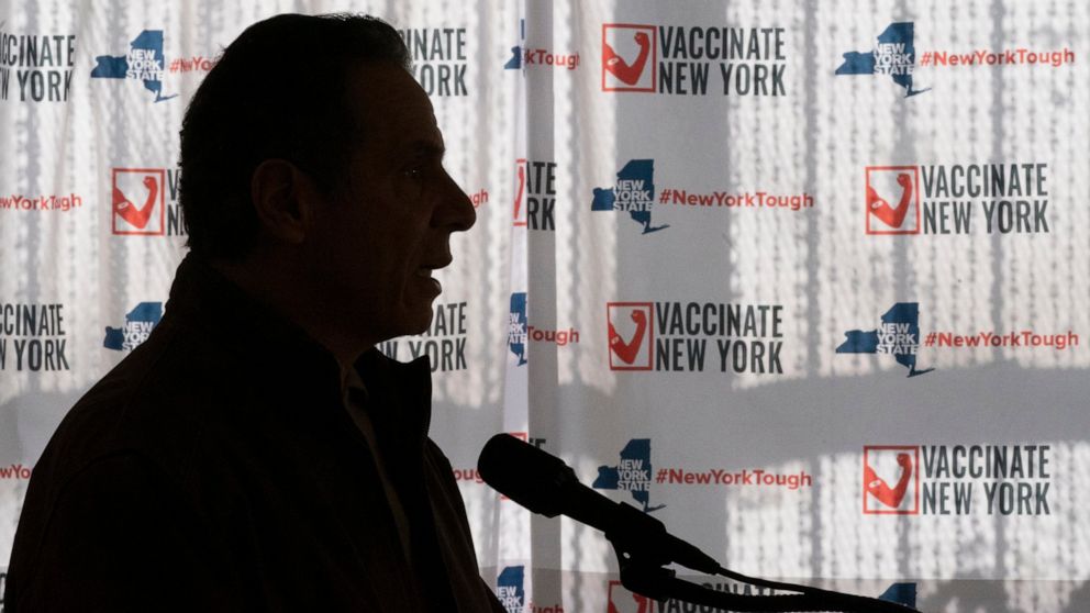 FILE - In this Saturday, Jan. 23, 2021 file photo, Gov. Andrew Cuomo speaks to reporters during a news conference at a COVID-19 pop-up vaccination site in the William Reid Apartments in the Brooklyn borough of New York. More than 9,000 recovering cor