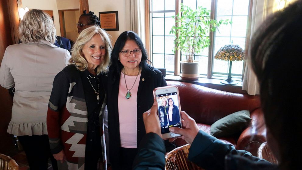 FILE - In this May 22, 2019, file photo, Jill Biden, left, and Tuba City Regional Health Care Corp. CEO Lynette Bonar pose for photos after an event in Flagstaff, Ariz. Biden is traveling to the country's largest Native American reservation, the Nava
