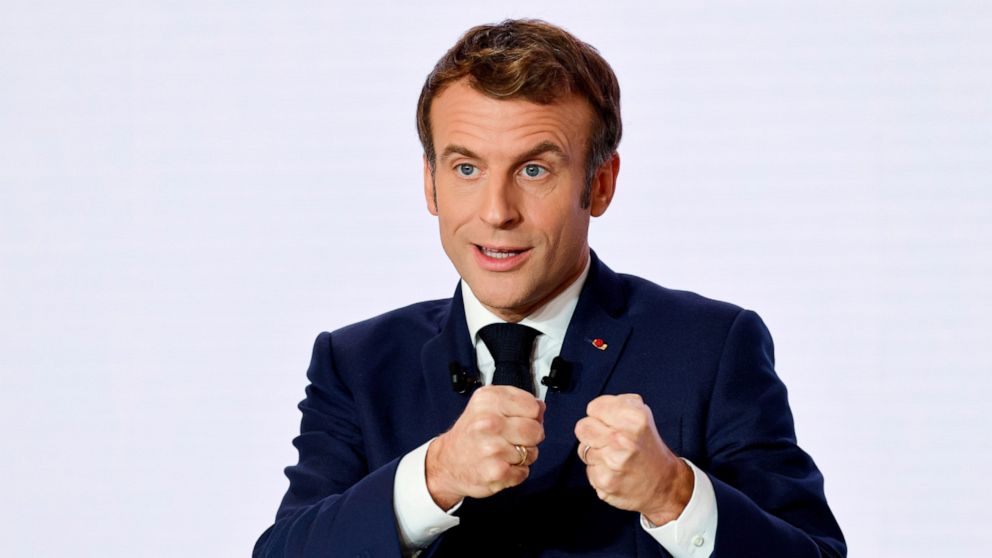 FILE - French President Emmanuel Macron gestures as he delivers a speech during a press conference on France assuming EU presidency, Thursday, Dec. 9, 2021 in Paris. President Emmanuel Macron has provoked outcries in parliament and shrill protests fr