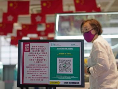 Hong Kong leader defends health code plans to combat COVID