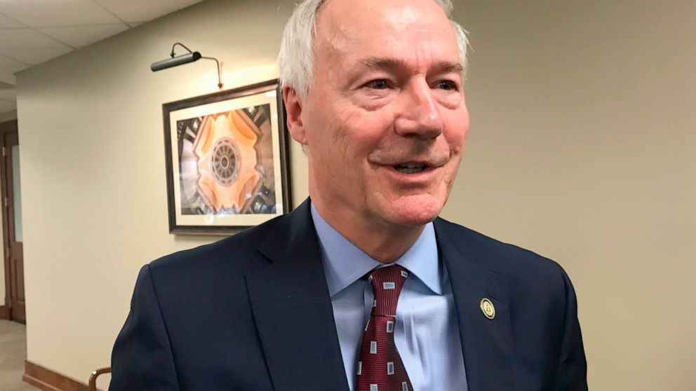 FILE - In this Jan. 13, 2020, file photo, Arkansas Gov. Asa Hutchinson speaks to reporters in Little Rock, Ark. Hutchinson on Tuesday, March 9, 2021, signed into law legislation banning nearly all abortions in the state, a sweeping measure that suppo