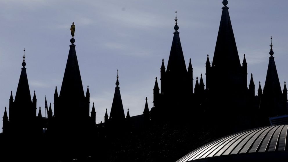 Mormon church to require masks in temples amid COVID surge