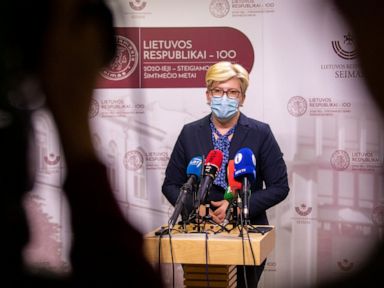 Lithuania's parliament OKs new PM, then closes due to virus