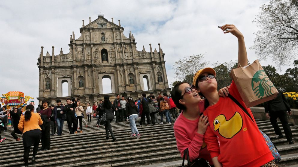 Macao orders closure of entertainment venues, mass-testing