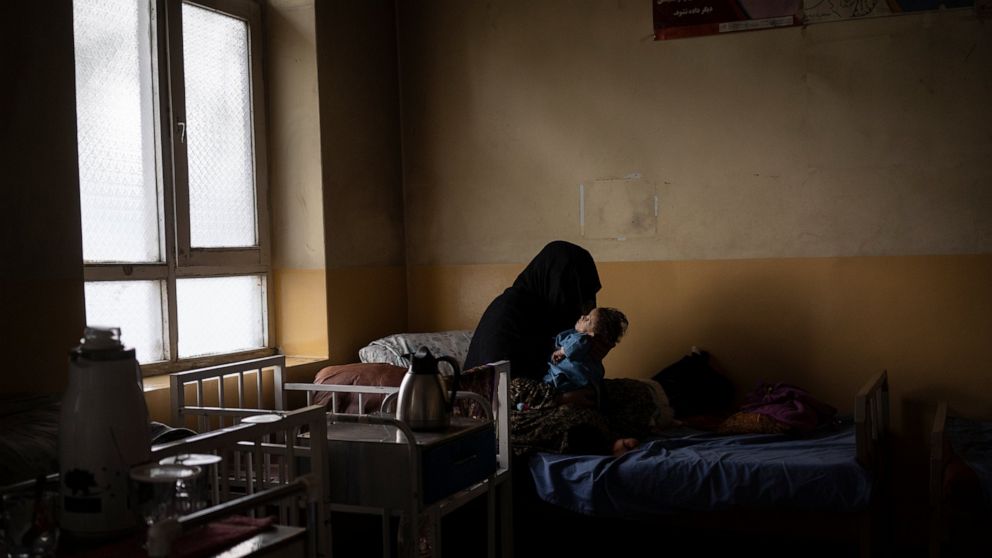 In Afghan hospital, unpaid doctors and rigid Taliban clash