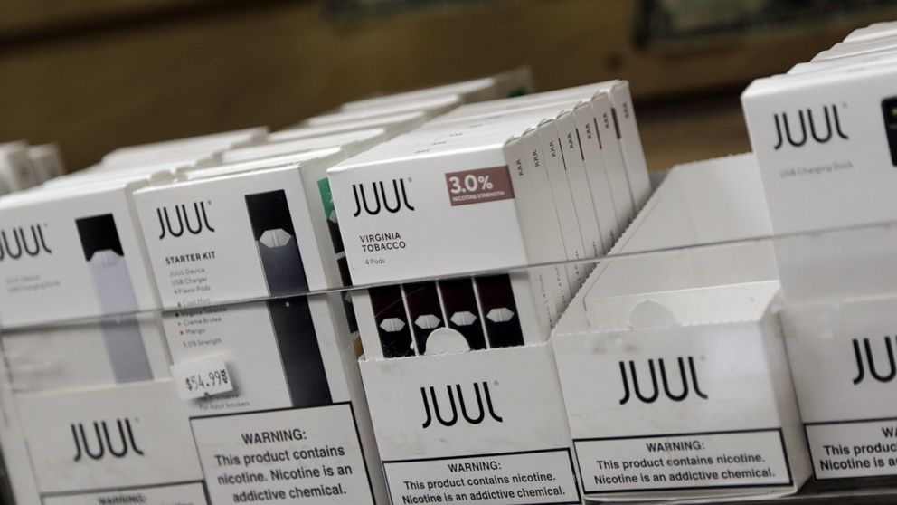 FILE - This Thursday, Dec. 20, 2018, file photo shows Juul products for sale. North Carolina’s attorney general has filed a lawsuit against the popular e-cigarette maker JUUL, asking a court to limit what flavors it can sell and ensure underage teens