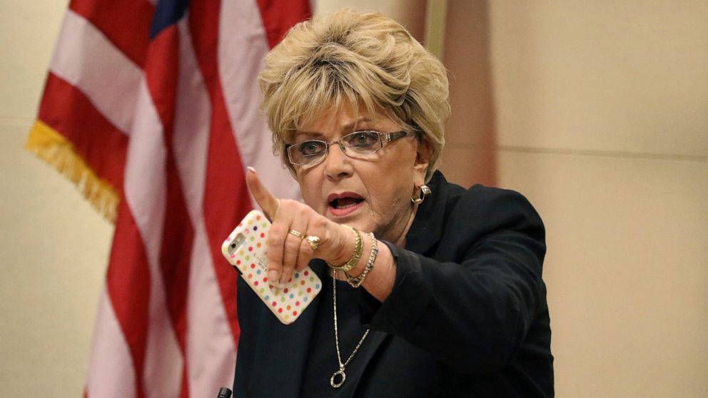 FILE - In this Nov. 6, 2019, file photo, Las Vegas Mayor Carolyn Goodman points toward protesters during the council meeting where the city council was considering a ban on homeless camping in Las Vegas. Nevada officials condemned comments Wednesday,