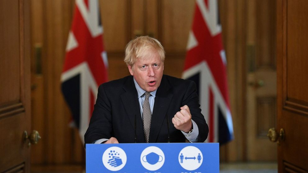 Britain's Prime Minister Boris Johnson speaks during a virtual press conference at Downing Street, London, Wednesday Sept. 9, 2020, following the announcement that the legal limit on social gatherings is set to be reduced from 30 people to six. The c